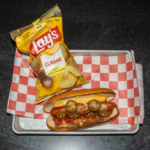 Bacon Wrapped Street Dog Sandwich.